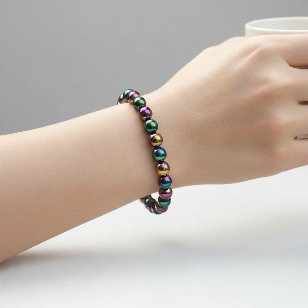 Bracelet Hématite arc en ciel Chine A (boules de 7-8mm) - La Boite à Cailloux