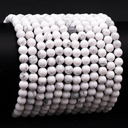 Bracelet howlite Zimbabwe A (boules 5 - 6mm) - La Boite à Cailloux
