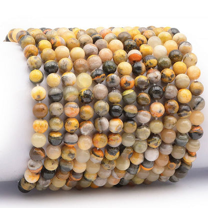Bracelet jaspe Bumble Bee Indonésie AA (boules 6.5 - 7.5mm) - La Boite à Cailloux