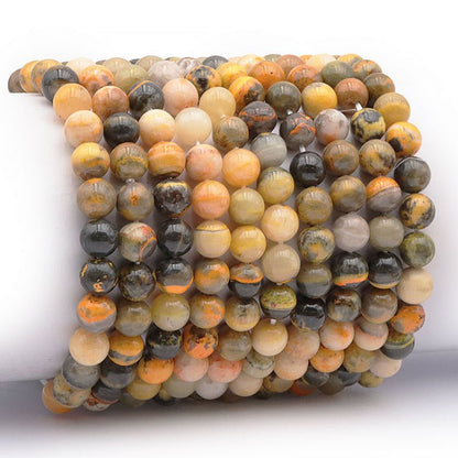 Bracelet jaspe Bumble Bee Indonésie AA (boules 7.5 - 8.5mm) - La Boite à Cailloux