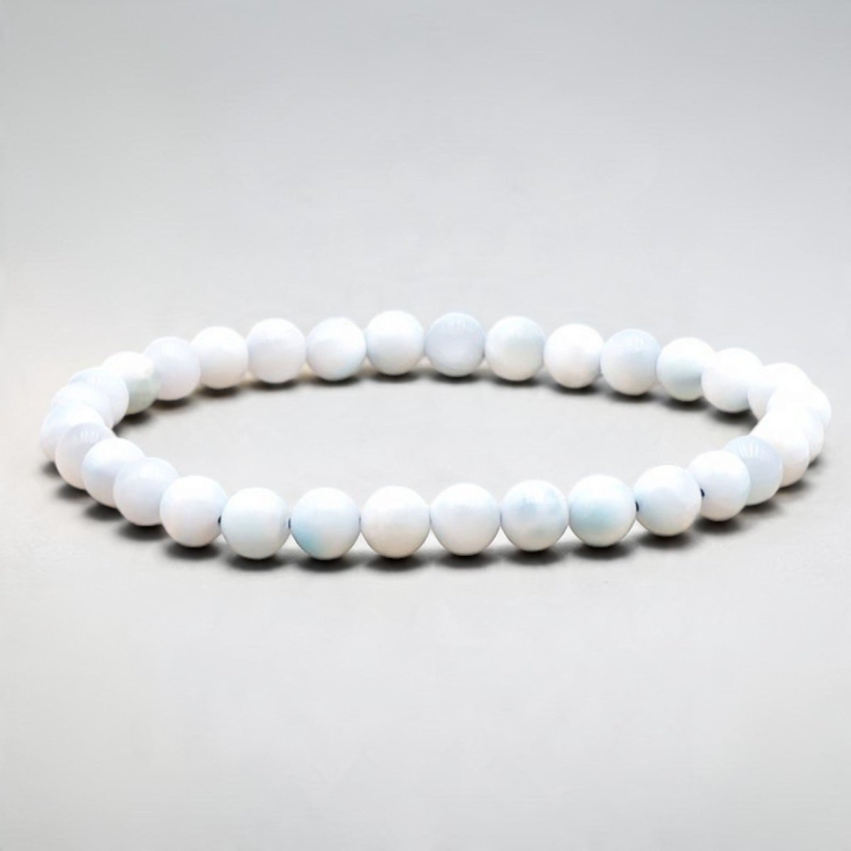 Bracelet larimar République Dominicaine A (boules 5-6mm) - La Boite à Cailloux