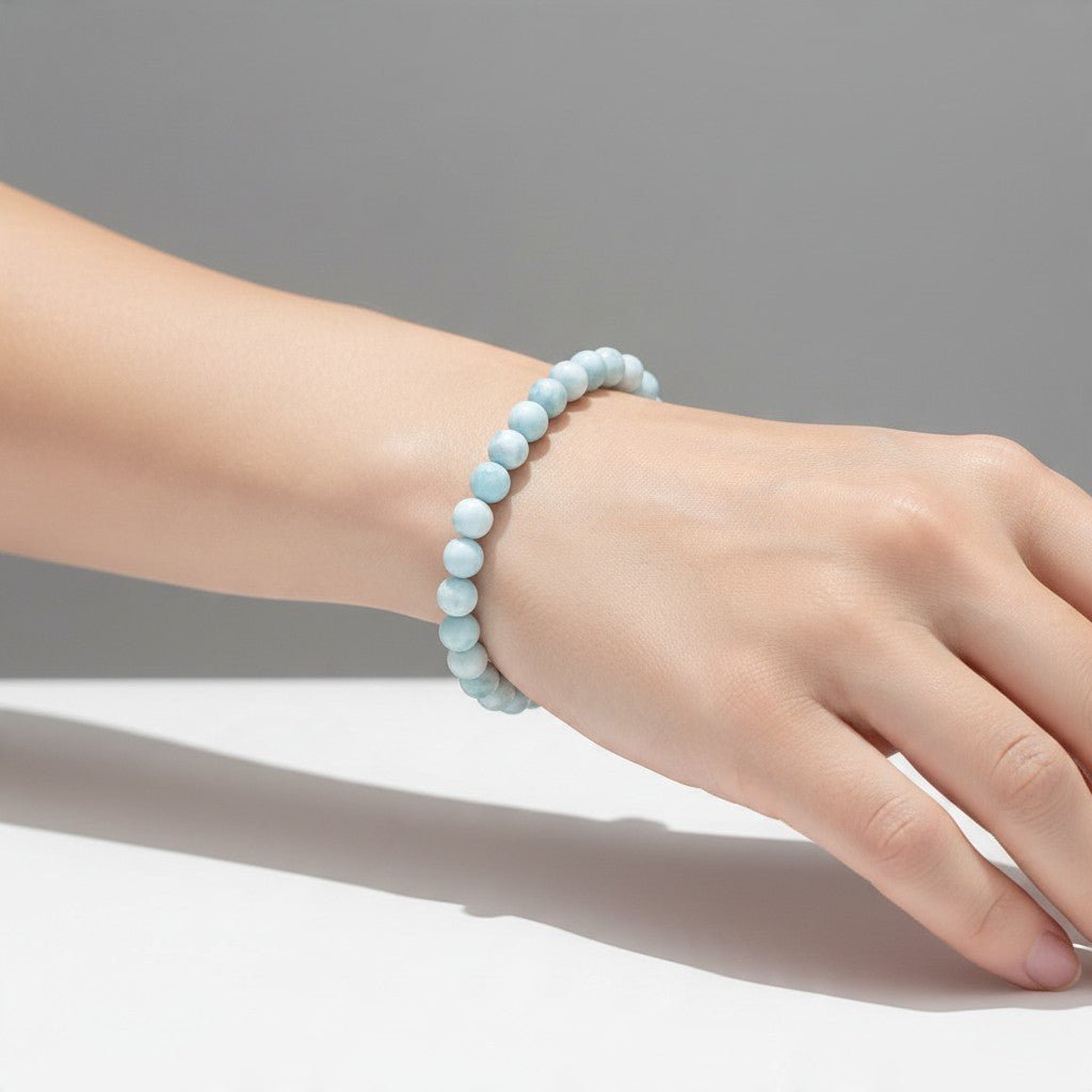 Bracelet larimar République Dominicaine AA (boules 5-6mm) - La Boite à Cailloux