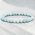 Bracelet larimar République Dominicaine AA (boules 7-8mm) - La Boite à Cailloux
