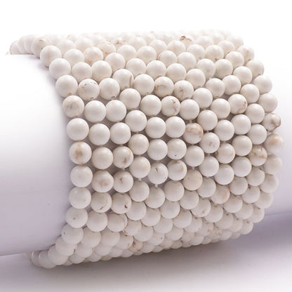 Bracelet magnésite Afrique du Sud A (boules 5 - 6mm) - La Boite à Cailloux