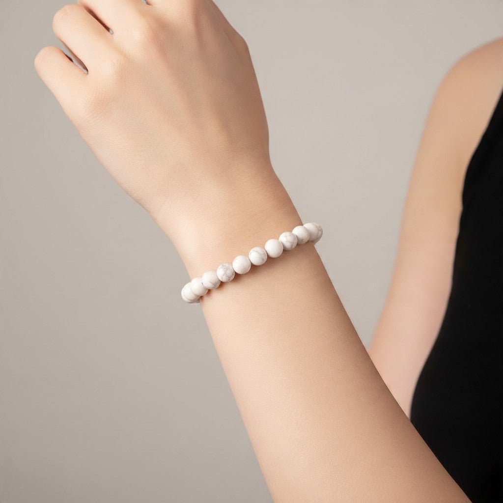 Bracelet magnésite Afrique du Sud A (boules 5-6mm) - La Boite à Cailloux