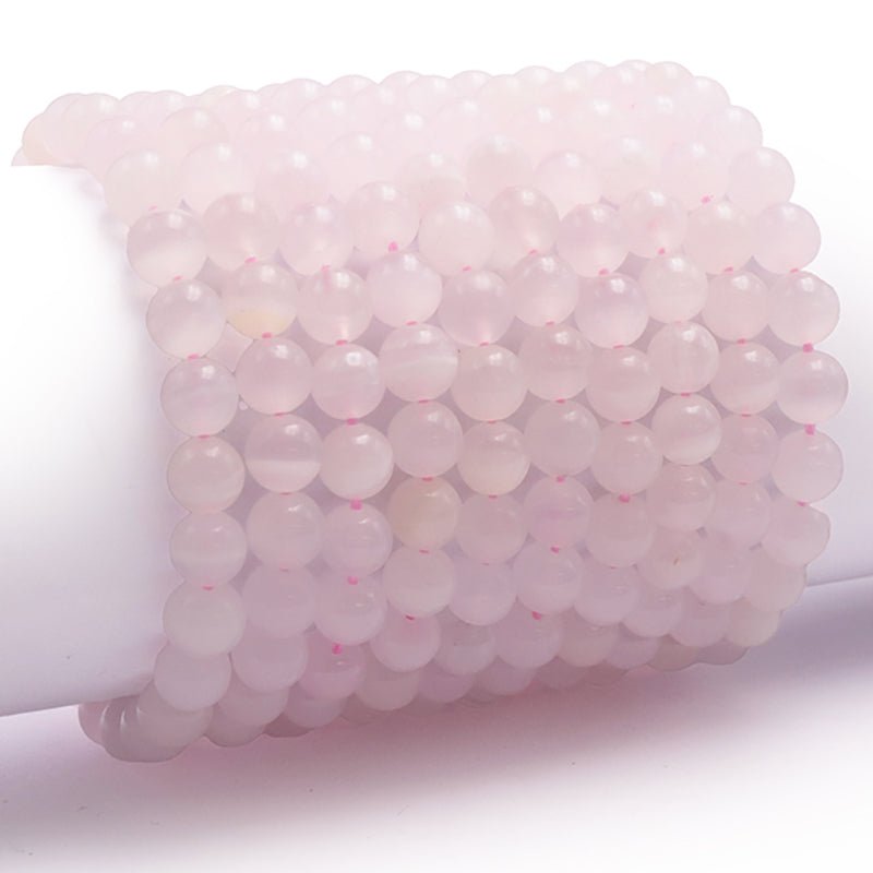 Bracelet manganocalcite Pérou A boules 7 - 8mm - La Boite à Cailloux