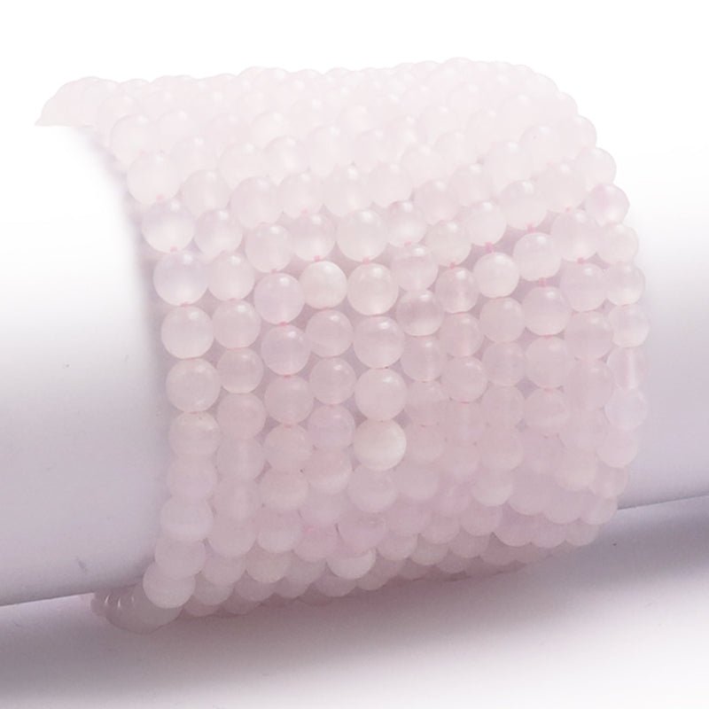 Bracelet manganocalcite Pérou AA boules 5 - 6mm - La Boite à Cailloux