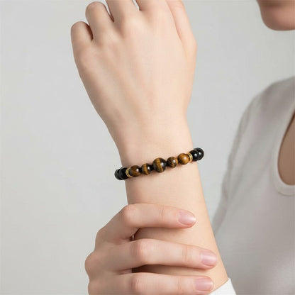 Bracelet Multi onyx et oeil de tigre A (boules 8mm et 10mm) - doré - La Boite à Cailloux