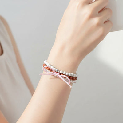 Bracciale multi-pietre howlite-diaspro rosso-cristallo di rocca A+ (sfere 5-6mm)