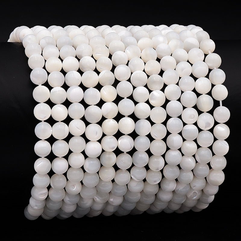 Bracelet nacre Chine A boules 5 - 6mm - La Boite à Cailloux