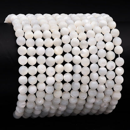 Bracelet nacre Chine A boules 5 - 6mm - La Boite à Cailloux