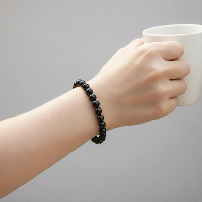 Bracelet onyx noir Brésil A (boules 7-8mm) - La Boite à Cailloux