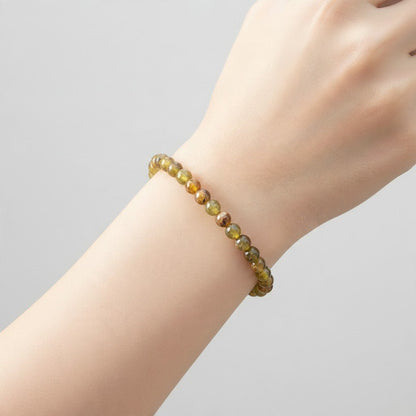 Bracelet péridot Inde A (boules 5-6mm) - La Boite à Cailloux