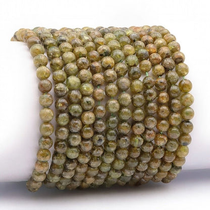 Bracelet péridot Inde A (boules 5 - 6mm) - La Boite à Cailloux