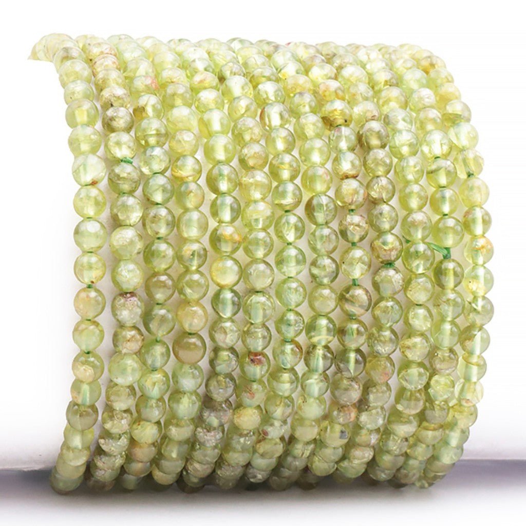 Bracelet péridot Inde A+(boules 3 - 4mm) - La Boite à Cailloux