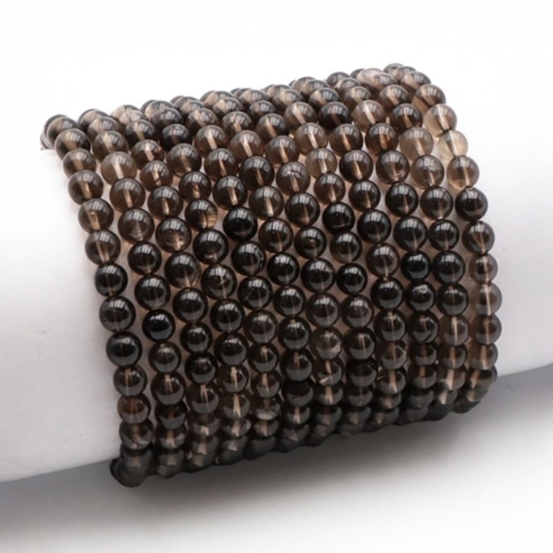Bracelet quartz fumé Etats - Unis A (boules 5 - 6mm) - La Boite à Cailloux