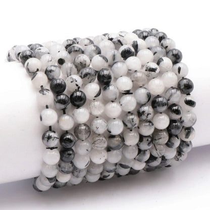 Bracelet quartz inclusions de tourmaline Brésil A (boules 7-8mm) - La Boite à Cailloux