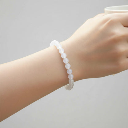 Bracelet quartz neige Brésil A (boules 5-6mm) - La Boite à Cailloux