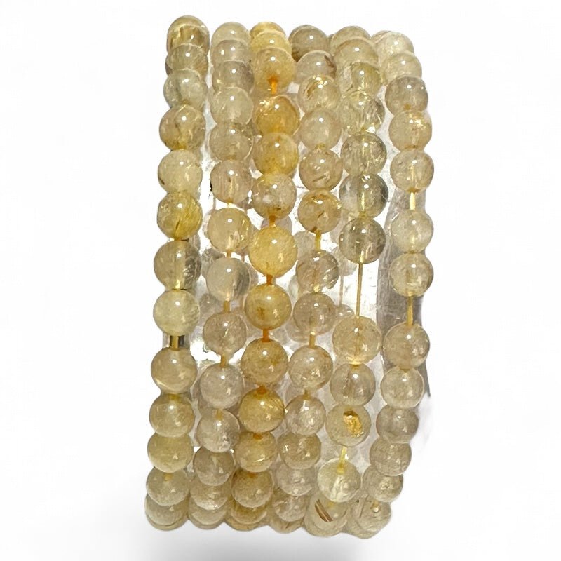 Bracelet quartz rutile Brésil A (boules 6 - 7mm) - La Boite à Cailloux