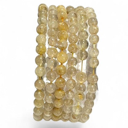 Bracelet quartz rutile Brésil A (boules 6 - 7mm) - La Boite à Cailloux
