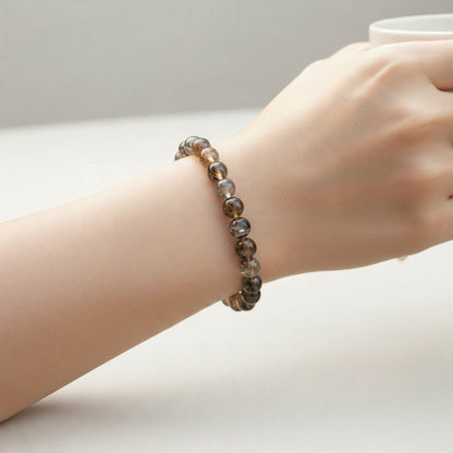Bracelet quartz rutile hématite Brésil AAA (boules 6,5-7,5mm) - La Boite à Cailloux