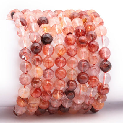 Bracelet quartz rutile Himalaya AA (boules 7 - 8mm) - La Boite à Cailloux