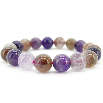 Bracelet quartz super seven Brésil A+ (boules 11 - 12mm) - La Boite à Cailloux