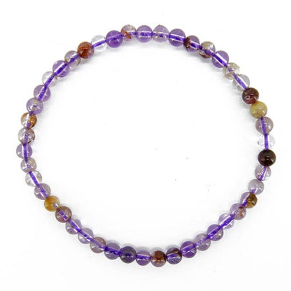 Bracelet quartz super seven Brésil A+ (boules 3 - 4mm) - La Boite à Cailloux