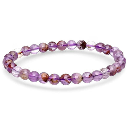 Bracelet quartz super seven Brésil A+(boules 5 - 6mm) - La Boite à Cailloux