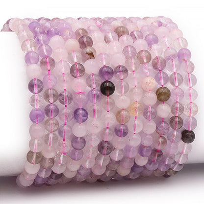 Bracelet quartz super seven Brésil A+(boules 5 - 6mm) - La Boite à Cailloux