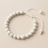 Bracelet réglable coulissant howlite Zimbabwe A boules 8mm - La Boite à Cailloux