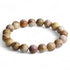 Bracelet rhyolite coucher de soleil Indonésie A (boules 10mm) - La Boite à Cailloux