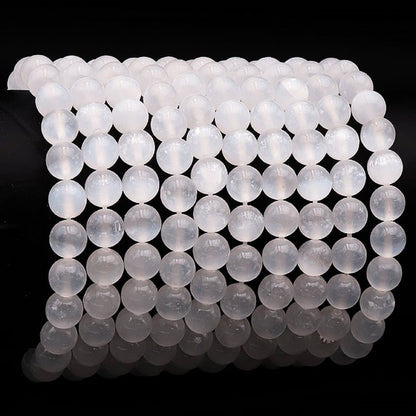 Bracelet sélénite Maroc AA (boules 7 - 8mm) - La Boite à Cailloux