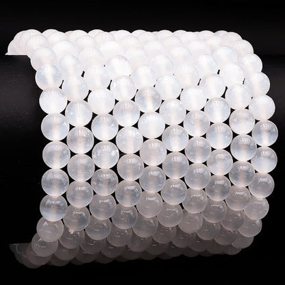 Bracelet sélénite Maroc AA (boules 7 - 8mm) - Taille L - La Boite à Cailloux