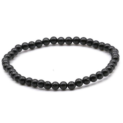 Bracelet spinelle noir Thaïlande A (boules 3 - 4mm) - La Boite à Cailloux