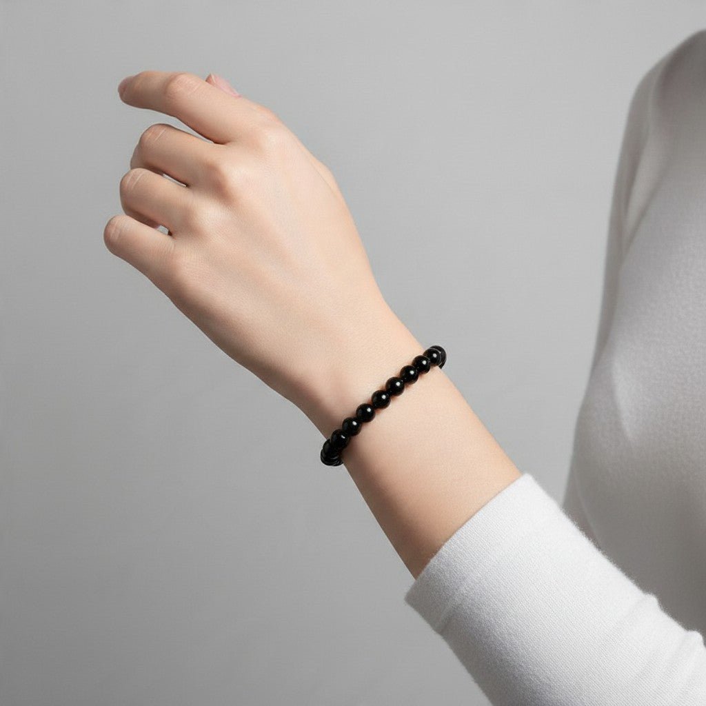 Bracelet spinelle noir Thaïlande A (boules 5-6mm) - La Boite à Cailloux