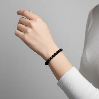 Bracelet spinelle noir Thaïlande A (boules 5-6mm) - La Boite à Cailloux