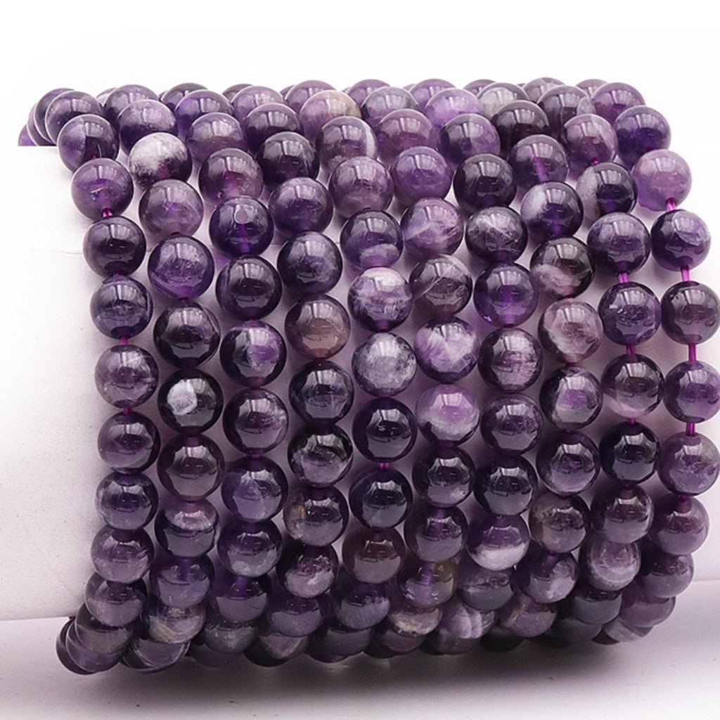 Bracelet taille enfants améthyste rubanée Brésil A (boules 7 - 8mm) - La Boite à Cailloux