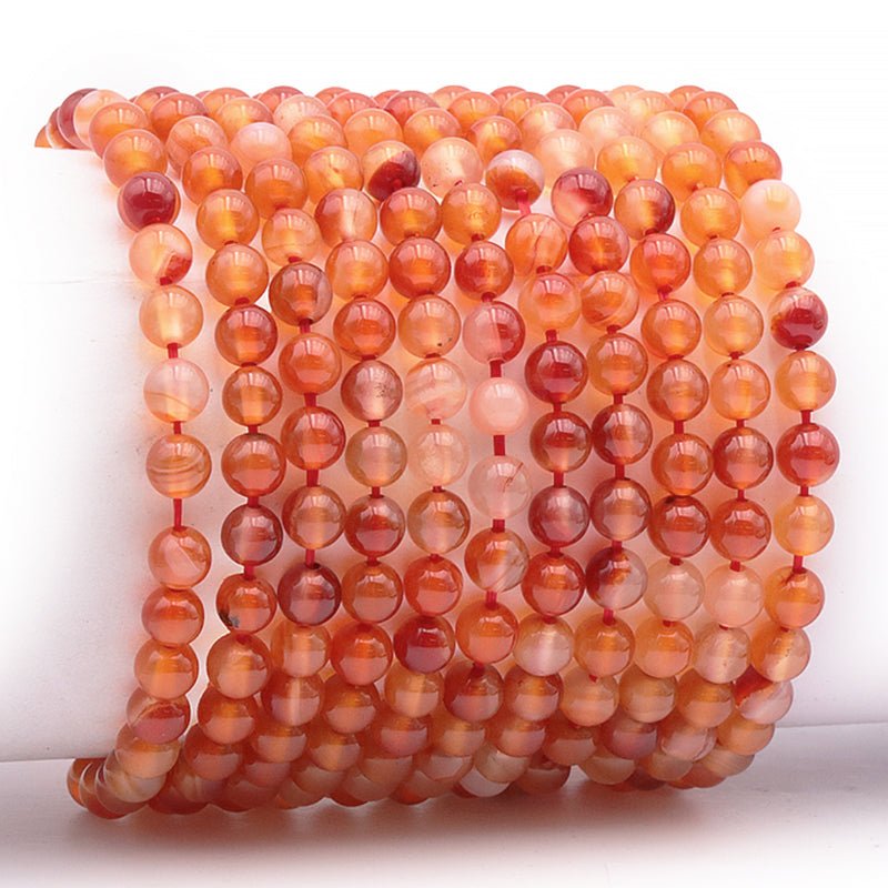 Bracelet taille enfants cornaline naturelle Brésil A (boules 5 - 6mm) - La Boite à Cailloux