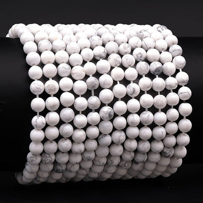 Bracelet taille enfants howlite A (boules 5 - 6mm) - La Boite à Cailloux