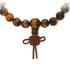 Bracelet tibétain oeil de tigre Afrique du Sud A Mâlâ Afrique (boules 7 - 8mm) - La Boite à Cailloux