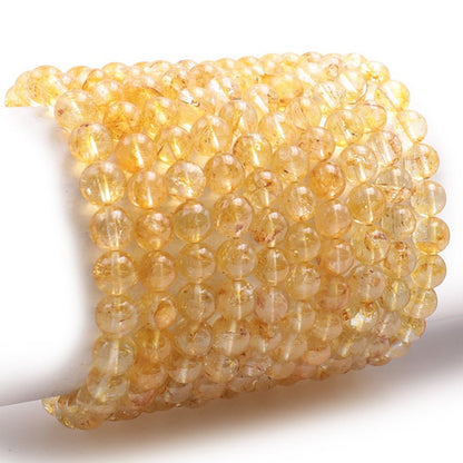 Bracelet topaze impériale Brésil AA+ (boules 8 - 9mm) - La Boite à Cailloux