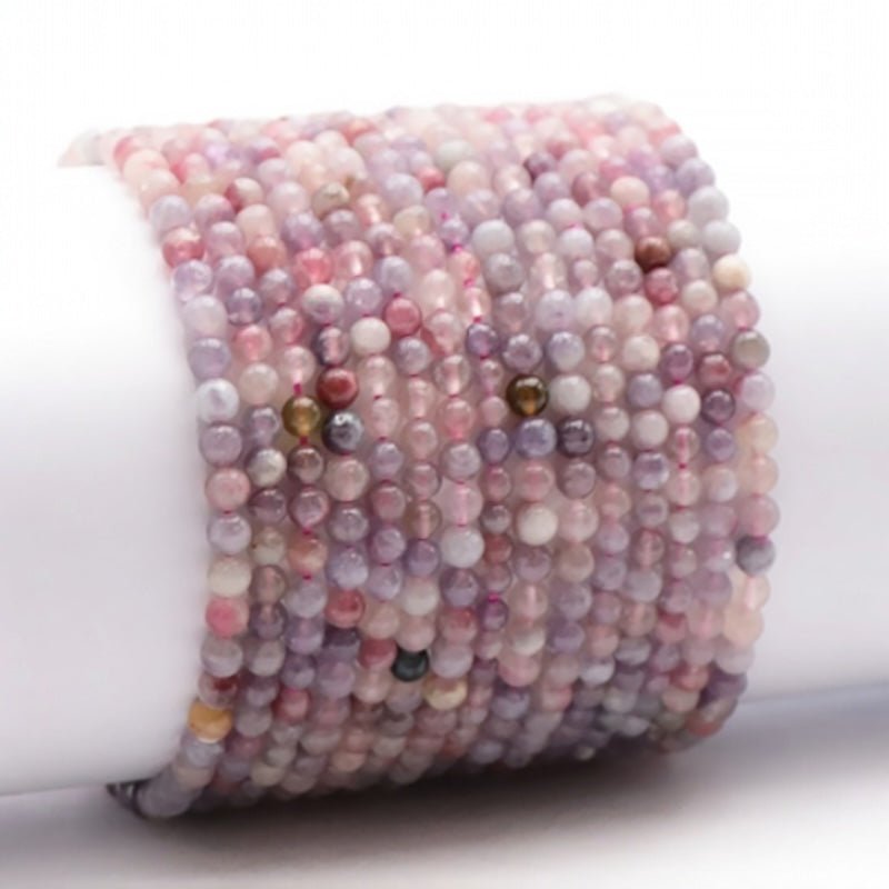 Bracelet tourmaline rose sur Eudialyte Namibie A+ (boules 3 - 4mm) - La Boite à Cailloux