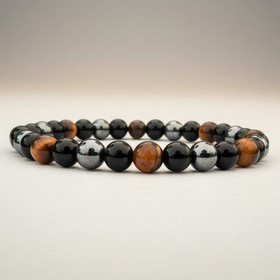 Bracelet triple protection (oeil de tigre, obsidienne, hématite) A (boules 5-6mm)