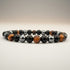 Bracelet triple protection (oeil de tigre, obsidienne, hématite) A (boules 5 - 6mm) - La Boite à Cailloux