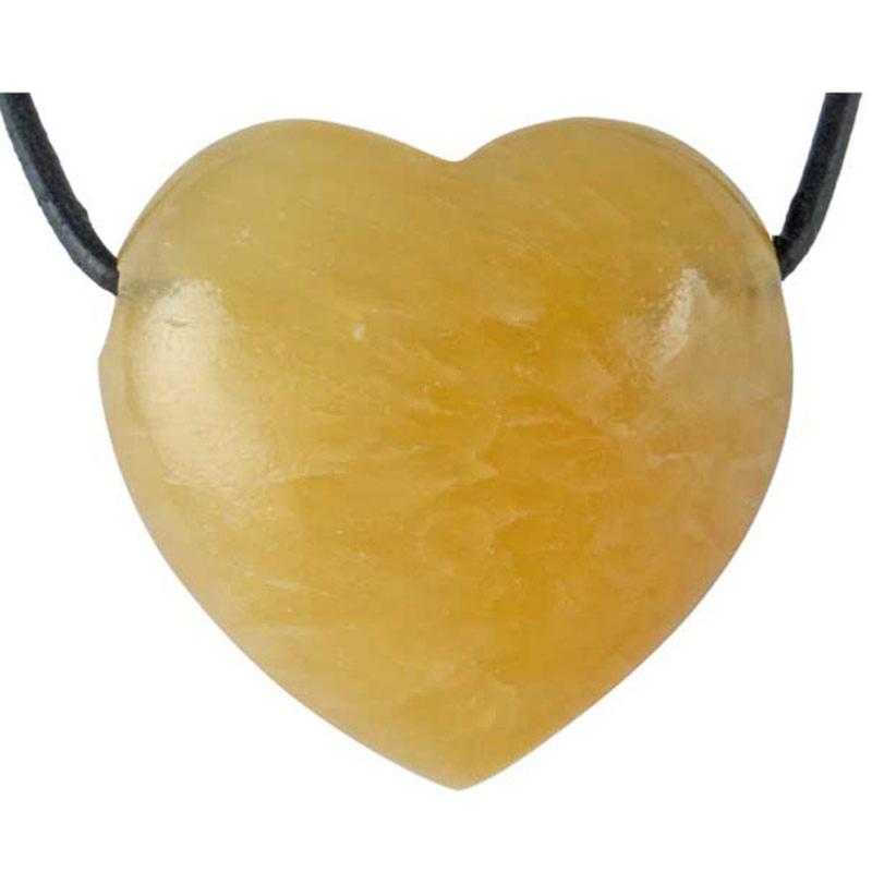 Coeur percé calcite orange Mexique A 30mm + cordon - La Boite à Cailloux