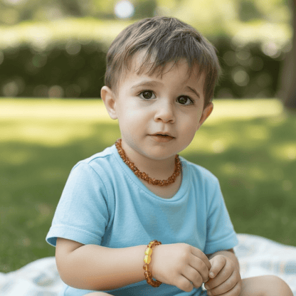 Collier bébé ambre cognac Lituanie AA (perles baroques) - La Boite à Cailloux