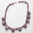 Collier rhodonite Australie A (pierres taillées) - La Boite à Cailloux