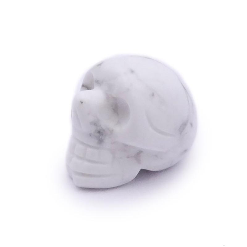 Crane howlite Zimbabwe A 20mm - La Boite à Cailloux