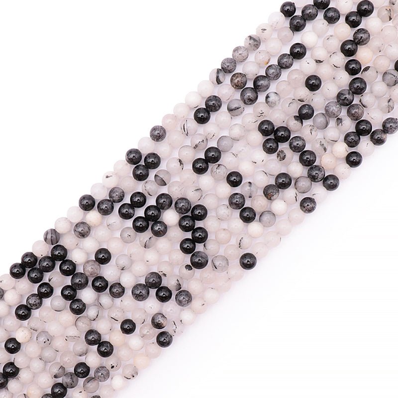 Fil quartz avec inclusions de tourmaline Brésil GRADE A - La Boite à Cailloux